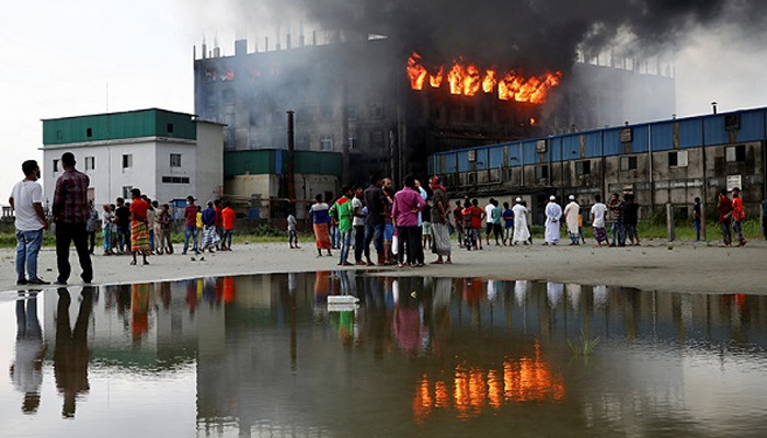 Photo of 52 workers killed in factory fire in Bangladesh