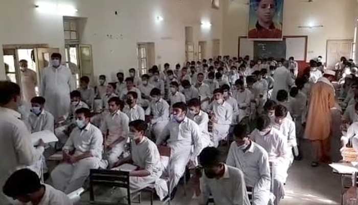 Students waiting for paper to start as board exams commence in KP. Photo Daniyal Aziz.