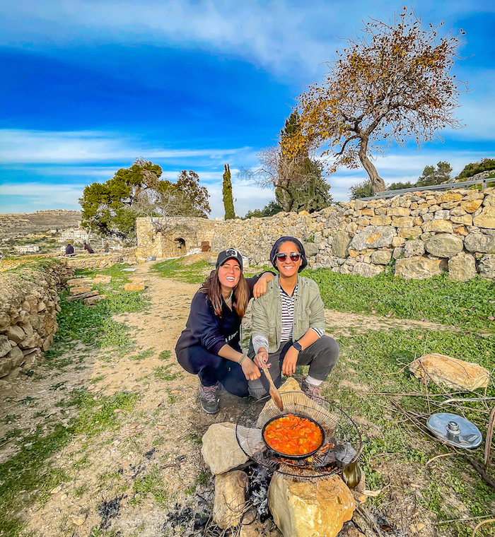 Travel bloggers Malak Hassan and Bisan Alhajhasan at Ein Qinya, a small village that lies seven kilometers northwest of Ramallah. Photo: Courtesy Ahlan Palestine