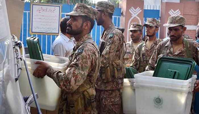 Pak Army troops transfer the election related material to different polling stations in connection with AJK Legislative Assembly elections in this APP file photo.