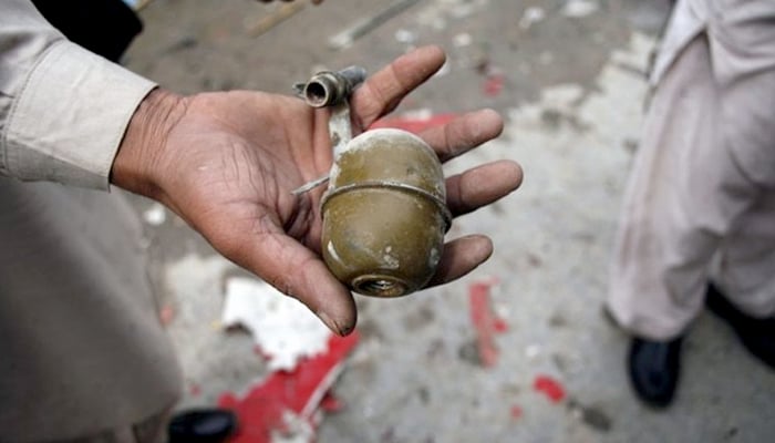 A man holding a grenade. — Reuters/File