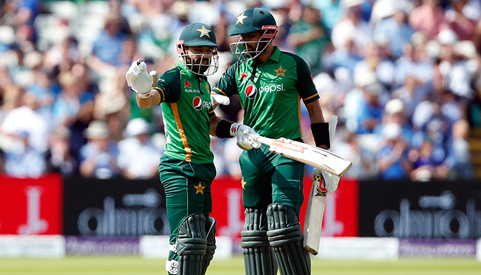 Third One Day International - England v Pakistan - Edgbaston Stadium, Birmingham, Britain - July 13, 2021 Pakistans Mohammad Rizwan celebrates his half century with Babar Azam. — Reuters