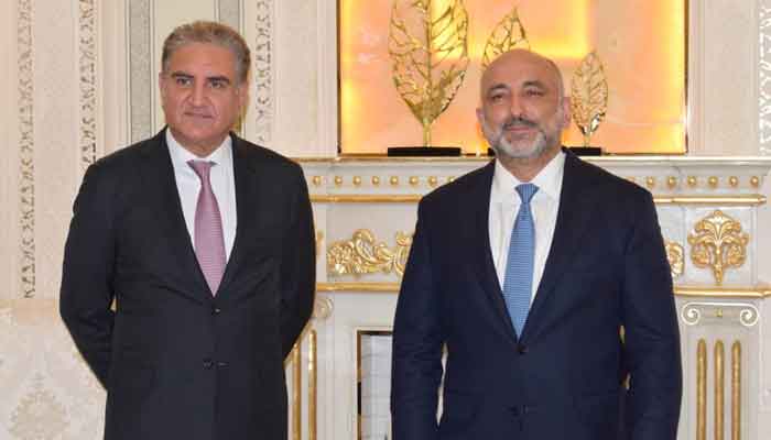 Minister for Foreign Affairs Shah Mahmood Qureshi meeting Foreign Minister of Afghanistan Hanif Atmar, on the sidelines of the Shanghai Cooperation Organization (SCO) Council of Foreign Ministers meeting in Dushanbe, Tajikistan, July 13, 2021. — PID