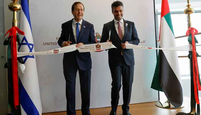 UAE Ambassador to Israel, Mohamed Al Khaja, and Israeli President Isaac Herzog cut a ribbon during the opening ceremony of the Emirati embassy in Tel Aviv, Israel July 14, 2021. — Reuters/Amir Cohen