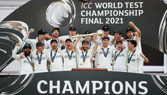 New Zealands Kane Williamson celebrates with the trophy and teammates after winning the final to the ICC World Test Championship, Rose Bowl, Southampton, Britain, June 23, 2021. — Action Images via Reuters/John Sibley