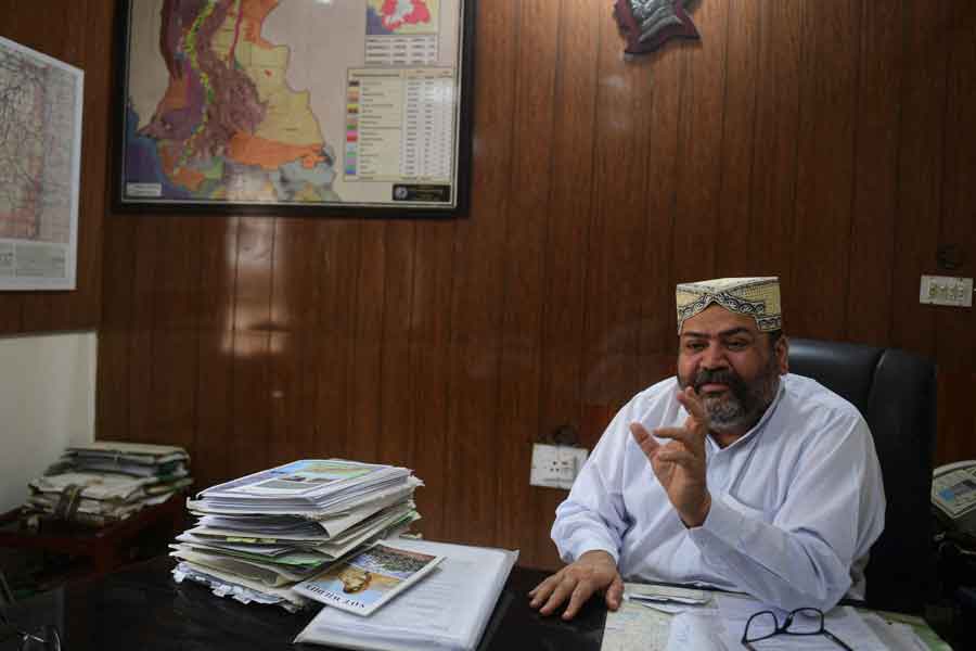 In this photograph taken on March 24, 2021, Adnan Hamid Khan, deputy conservator of Sindh Wildlife Department, explains measures to protect endangered dolphins during an interview with AFP at his office in the southern Sindh province city of Sukkur. — AFP