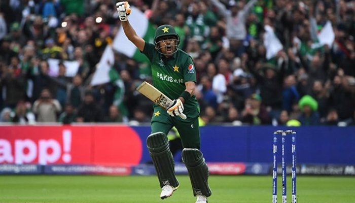 Pakistan captain Babar Azam pumps his fist in joy after scoring a century against New Zealand in the ICC World Cup 2019. Photo: AFP