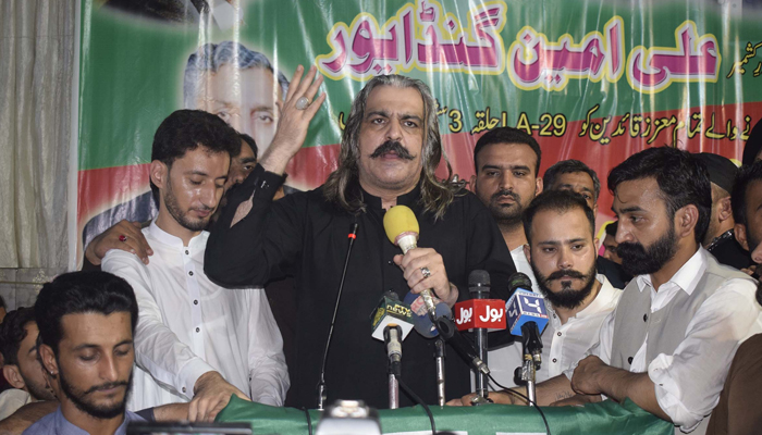 Federal Minister for Kashmir and Gilgit-Baltistan Affairs Ali Amin Gandapur addressing during a public gathering at Gojra area in the Muzaffarabad, Azad Jammu and Kashmir, on July 15, 2021. — Online/File