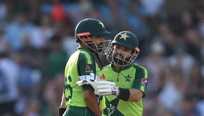 Mohammad Rizwan congratulates Babar Azam during the first T20 against England.