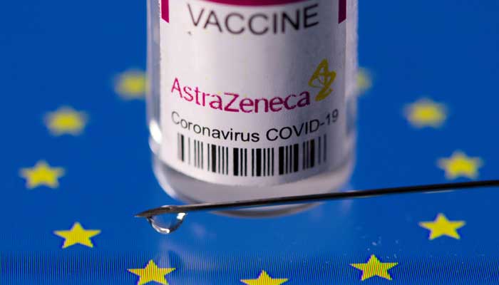 A vial labelled AstraZeneca coronavirus disease (COVID-19) vaccine placed on displayed EU flag is seen in this illustration picture taken March 24, 2021. Photo: Reuters