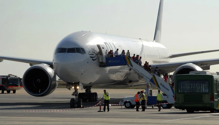 People getting off a PIA aircraft. — Reuters/File