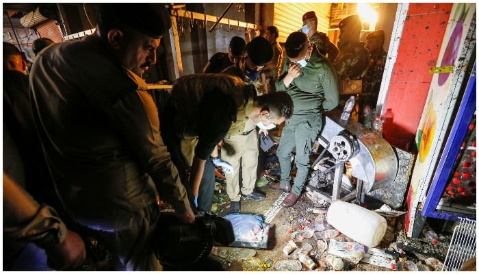 Iraqi security forces inspect the site of an explosion in Sadr City district of Baghdad, Iraq July 19, 2021. REUTERS/Wissam Al-Okaili.
