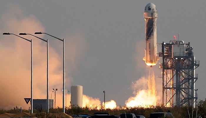 Billionaire businessman Jeff Bezos is launched with three crew members aboard a New Shepard rocket on the worlds first unpiloted suborbital flight from Blue Origins Launch Site 1 near Van Horn, Texas , U.S., July 20, 2021. — Reuters