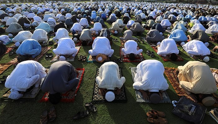 Pakistani Muslims attend Eid al-Fitr prayers to mark the end of the holy fasting month of Ramadan, amid the coronavirus disease (COVID-19) outbreak in Peshawar, Pakistan May 24, 2020. — Reuters/File