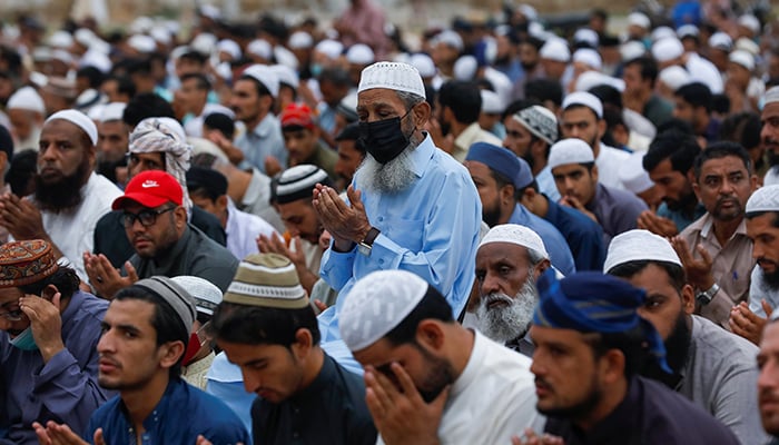 Muslims attend Eid ul Adha prayers at a playground, as the outbreak of the coronavirus disease (COVID-19) continues, in Karachi, Pakistan July 21, 2021. — Reuters