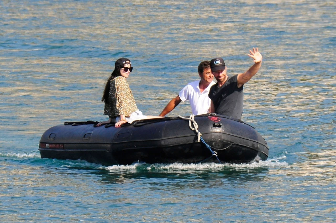 Photos: Dakota Johnson, Chris Martin caught boat riding in Spain