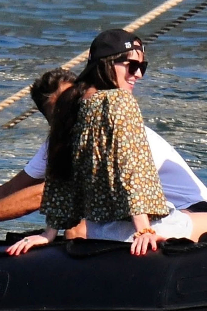 Photos: Dakota Johnson, Chris Martin caught boat riding in Spain