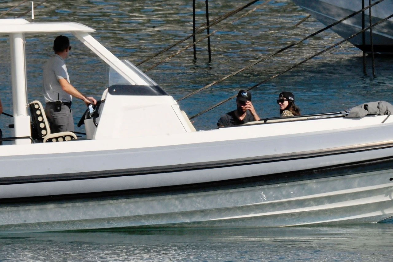 Photos: Dakota Johnson, Chris Martin caught boat riding in Spain