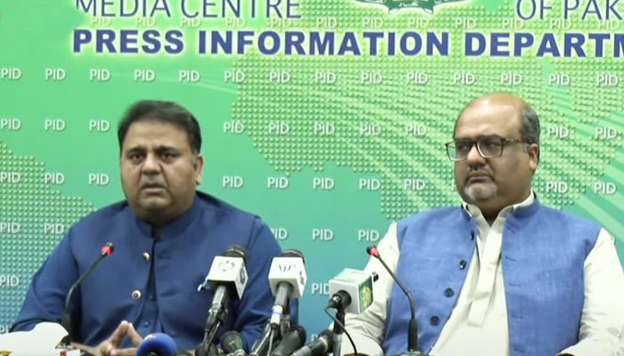 Minister for Information and Broadcasting Fawad Chaudhry (left) along with Adviser to Prime Minister on Interior and Accountability Shahzad Akbar addressing a press conference at Press Information Department in Islamabad, on July 24, 2021. — YouTube/HumNewsLive