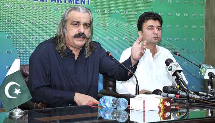 Federal Minister for Kashmir Affairs and Gilgit-Baltistan Ali Amin Khan Gandapur (L) jointly addressing a press conference with Federal Minister for Communications and Postal Services Murad Saeed, at PID Media Centre, Islamabad, on July 24, 2021. — APP photo by Saeed-ul-Mulk