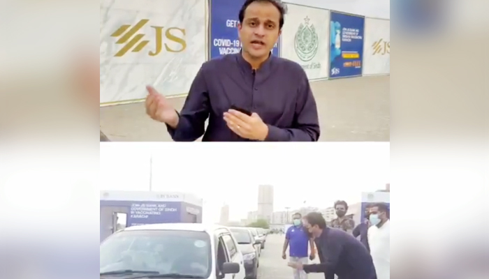 Sindh government spokesperson Murtaza Wahab can be seen speaking at the vaccination facility in Karachis Clifton area. — Twitter