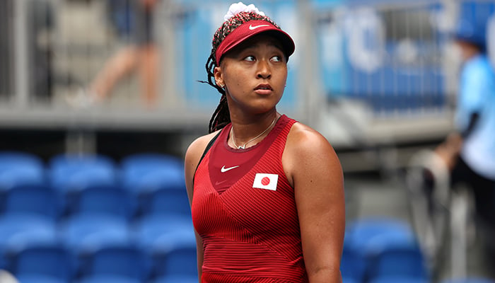 Tokyo 2020 Olympics - Tennis - Womens Singles - Round 2 - Ariake Tennis Park - Tokyo, Japan - July 26, 2021. Naomi Osaka of Japan reacts after winning her second-round match against Viktorija Golubic of Switzerland. — Reuters