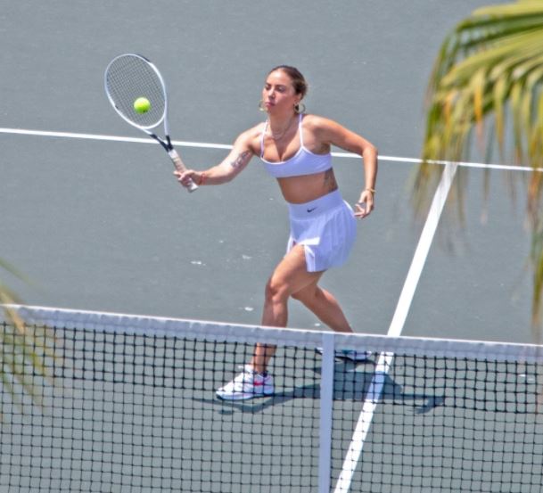Lady Gaga dresses all-white for tennis game during trip with boyfriend