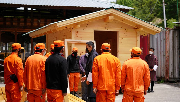 Bhutans King Jigme Khesar Namgyel Wangchuck visits a group of Desuups training at Carpentry Edelweiss during his visit to remote villages to oversee measures to contain the spread of the coronavirus disease (COVID-19) in Bumthang, Bhutan, June 7, 2021. — Reuters/File