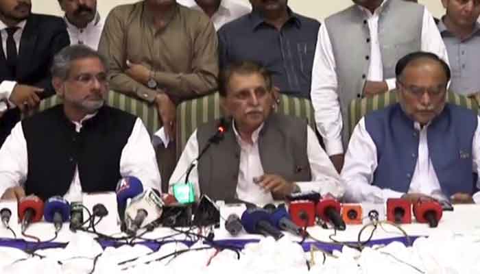 (L-R) Shahid Khaqan Abbasi, Raja Farooq Haider and Ahsan Iqbal of the PML-N, addressing a press conference, in Muzaffarabad, on July 27, 2021. — Twitter