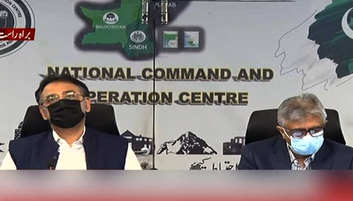 Federal ministers Asad Umar and Dr Faisal Sultan addressing media briefing at NCOC. Screengrab.