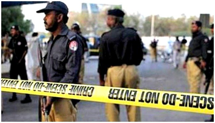 A file photo of policemen cordoning of an area