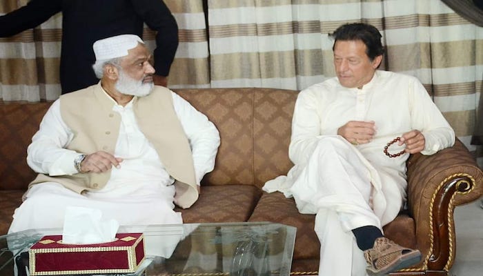 Former Sindh chief minister Dr Arbab Ghulam Rahim (left) with Prime Minister Imran Khan. Photo: Facebook/ Arbab Ghulam Rahim