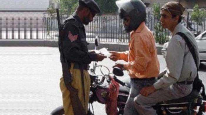 Sindh lifts ban on pillion riding Sindh lifts ban on pillion riding