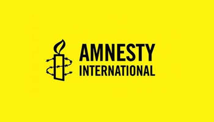 The logo of Amnesty International.