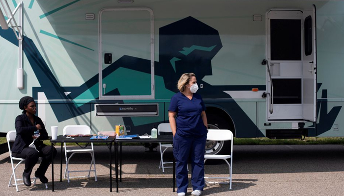 Nurses wait for people to come by to receive their coronavirus disease (COVID-19) vaccine at a mobile pop-up vaccination clinic hosted by the Detroit Health Department with the Detroit Public Schools Community District at East English Village Preparatory Academy in Detroit, Michigan, US, July 21, 2021. — Reuters/File