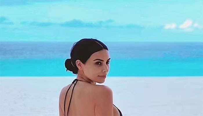 Kim Kardashian teases Kanye West in style as she shares her new beach snaps