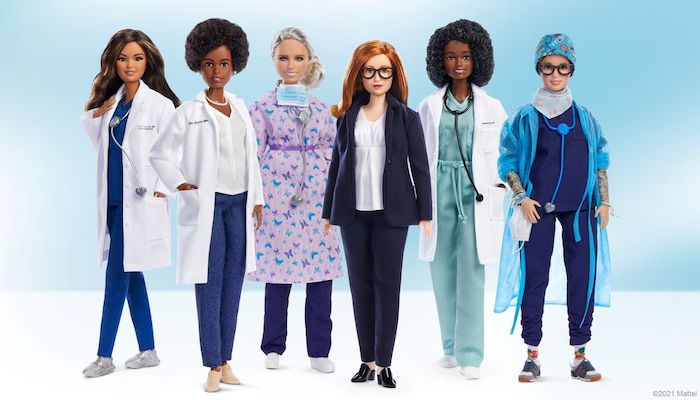 An undated handout image of a Barbie doll made in the likeness of Sarah Gilbert (3d R), the Oxford University professor who co-designed the Oxford/AstraZeneca vaccine, among a global lineup of women of healthcare sector honoured with a one-of-a-kind doll. University of Oxford/via REUTERS