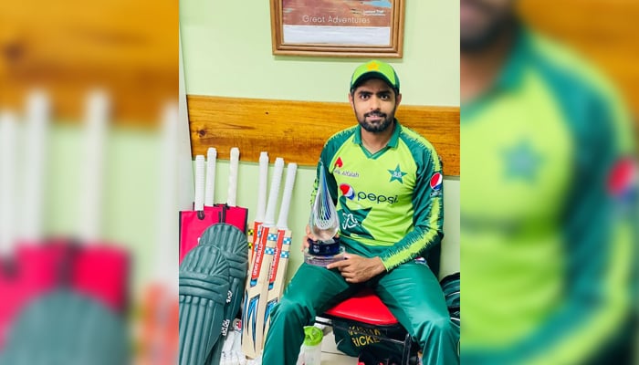 Pakistan skipper Babar Azam poses with the T20I series trophy after defeating West Indies at Guyanas Providence Stadium, on August 3, 2021. — Twitter/babarazam258