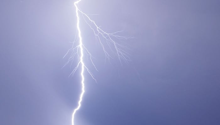 Lightning strikes west of Allegiant Stadium and Mandalay Bay Resort and Casino during a thunderstorm on July 25, 2021 in Las Vegas, Nevada. — AFP/File