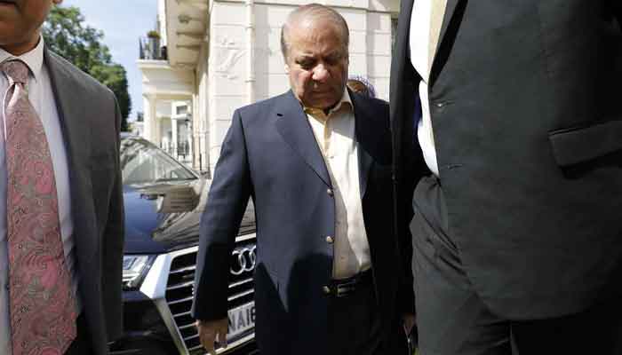 Former prime minister Nawaz Sharif arrives at his office, in central London, on July 6, 2018. — AFP