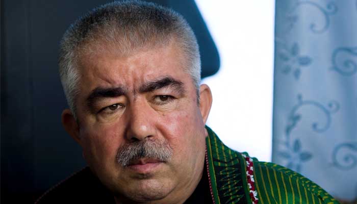 Afghan General Abdul Rashid Dostum speaks during an interview with Reuters at his Palace in Shibergan, in northern Afghanistan August 19, 2009. -REUTERS