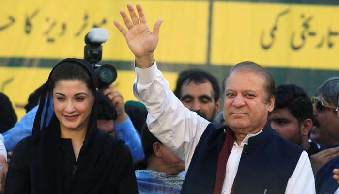 Nawaz Sharif (right), former Prime Minister and leader of PML-N, waves to supporters as his daughter Maryam Nawaz looks on during partys workers convention in Islamabad, Pakistan June 4, 2018. — Reuters/File