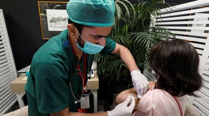 Pakistan opens coronavirus vaccines to 16-18 year-olds who need to travel