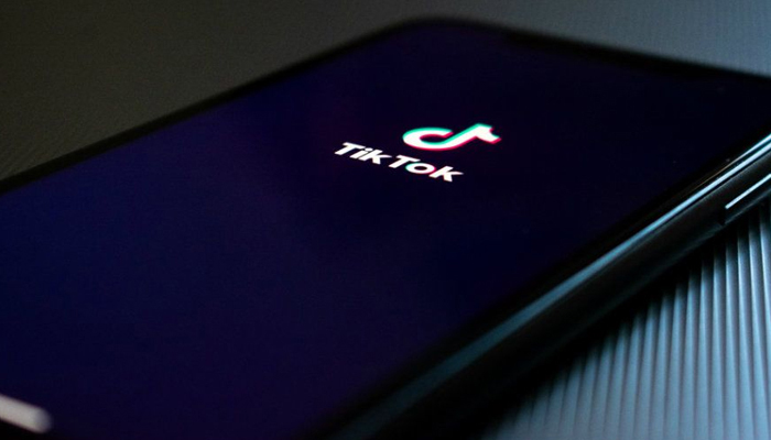 TikToks logo can be seen on a smart phone. — Unsplash/File