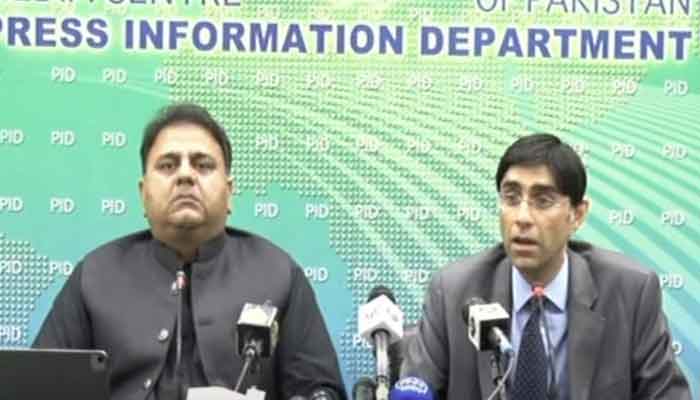 Minister for Information Fawad Chaudhry (L) and National Security Adviser Moeed Yusuf, address a press conference in Islamabad, to shed light on anti-state social media trends that were launched between 2019 and 2021, on August 11, 2021. — Geo News