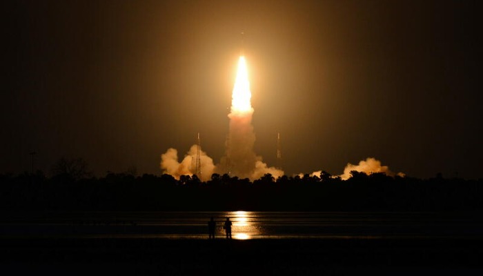 People watch as Indias Geosynchronous Satellite Launch Vehicle (GSLV-F10), carrying the earth observation satellite EOS-03, lifts off from the Satish Dhawan Space Centre in Sriharikota, India, August 12, 2021. REUTERS/Stringer