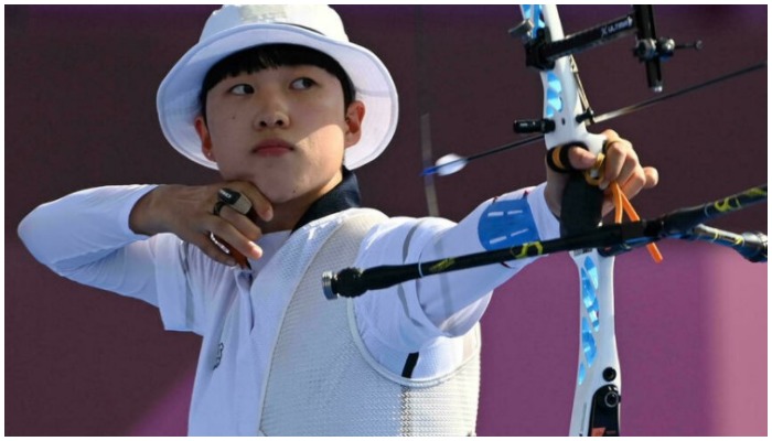 Anti-feminists are demanding that short-haired Olympic champion An San hand back her medals ADEK BERRY AFP/File.