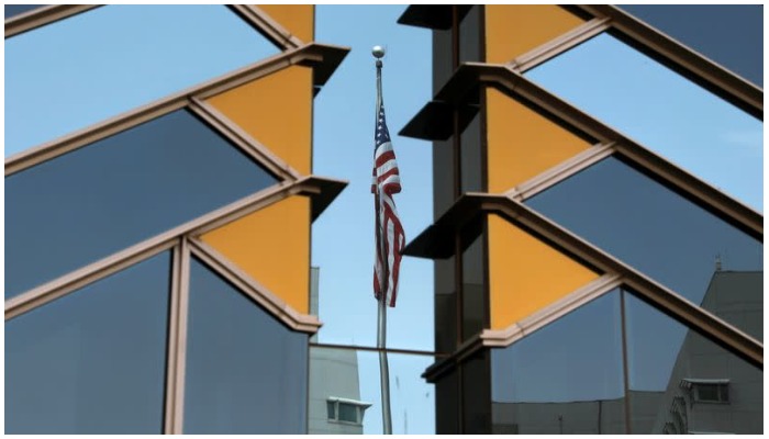 The U.S. flag is reflected on the windows of the U.S. Embassy in Kabul, Afghanistan July 30, 2021. — Reuters
