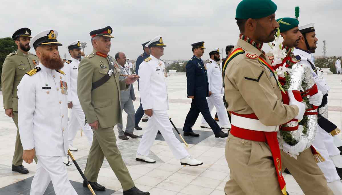Cadets lead officers from Pakistan Army, Navy and Air Force, to lay floral wreaths at the mausoleum of Pakistans founder, Quaid-e-Azam Mohammad Ali Jinnah, during a ceremony to celebrate Independence Day, in Karachi, Pakistan August 14, 2021. — Reuters/Akhtar Soomro