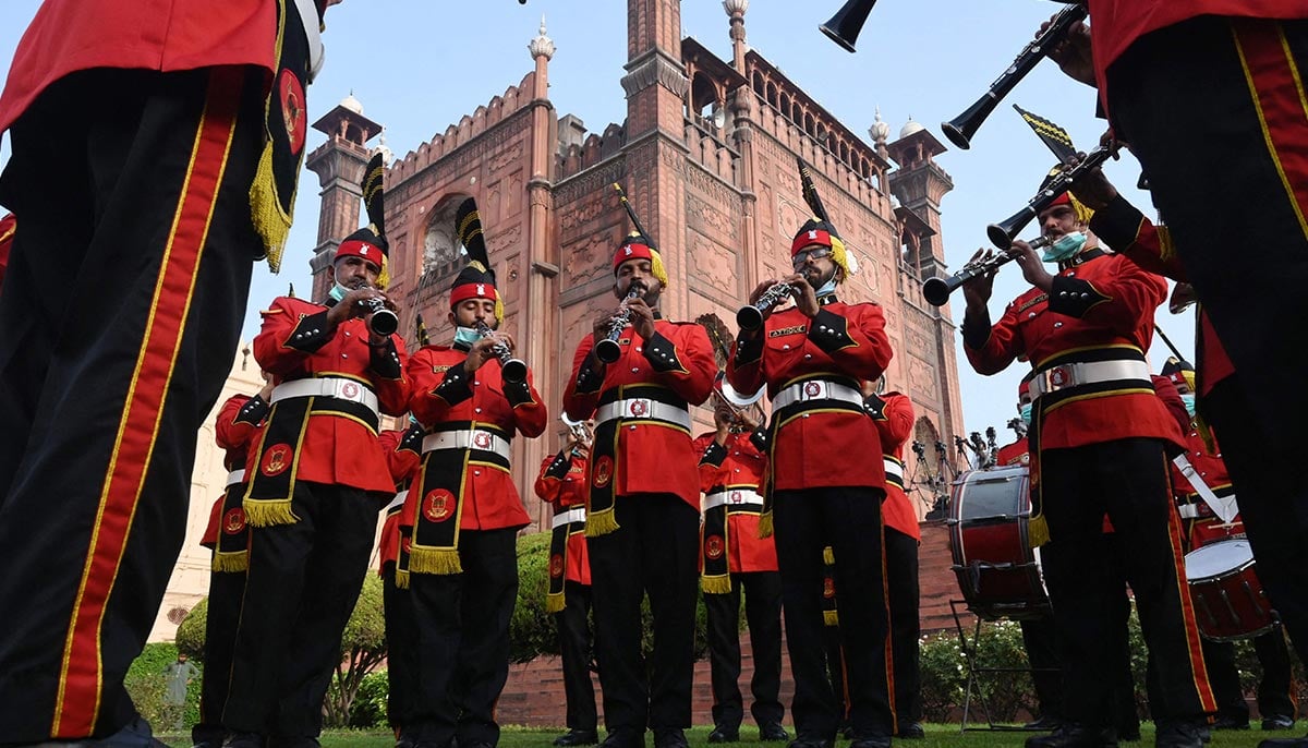 A Pakistan Rangers musical band performs at the tomb of national poet Allama Mohammad Iqbal during Pakistans 75th Independence Day celebrations in Lahore on August 14, 2021. — AFP